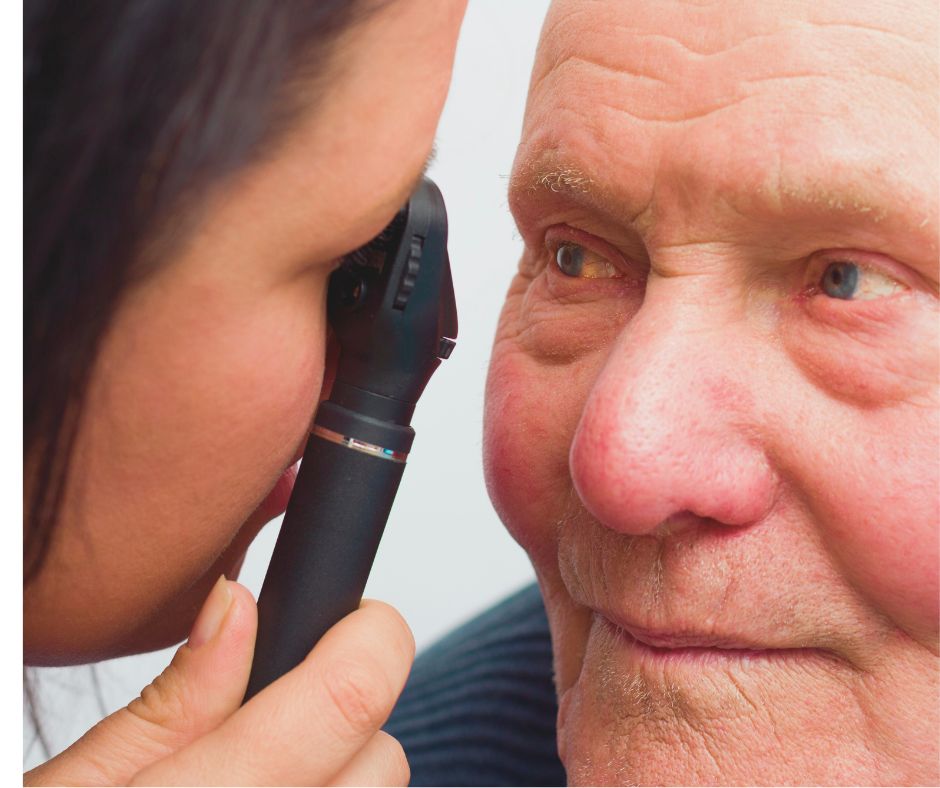 Aging man getting eye exam