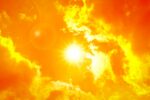 the sun in a hot summer sky