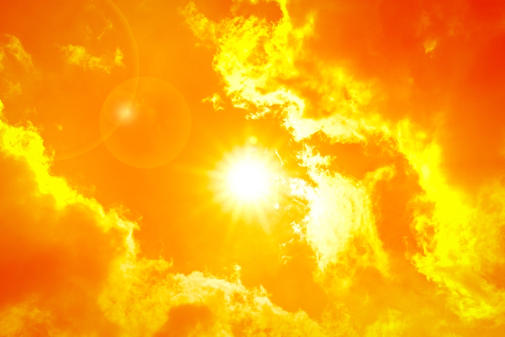 the sun in a hot summer sky